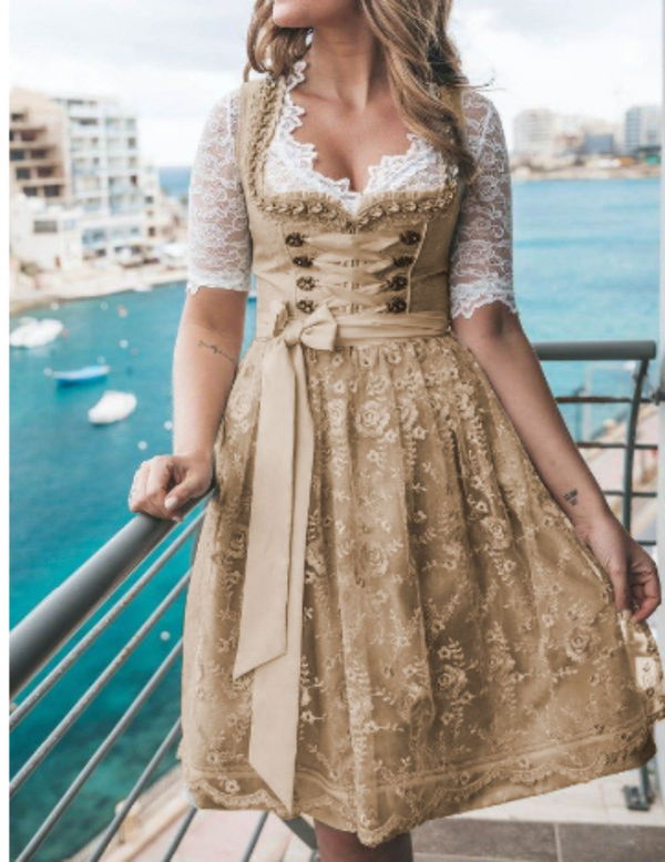 Elegante Trachtenkleidung für Damen mit Schürze und Bluse